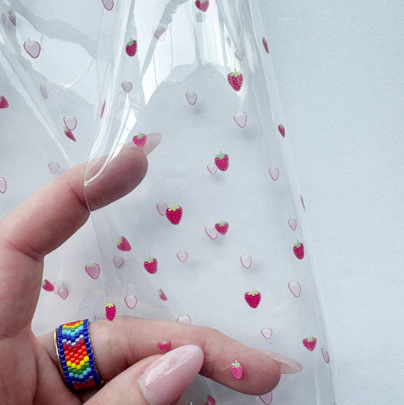 Sew Hungry Hippie - Tiny Strawberries Print TPU Vinyl – Clear Printed Vinyl Roll - 18" x 52" Precut